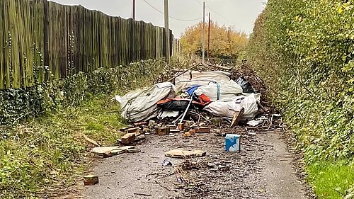 Fly tipping in country lane
