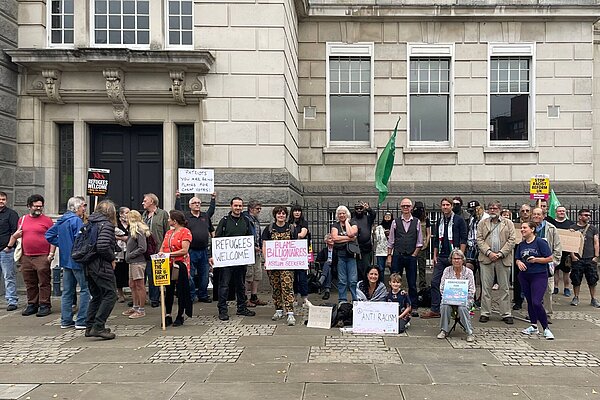 Lib Dem and Green councillors joined residents to oppose a small but noisy hard right demonstration in front of County Hall Lib Dem and Green councillors joined residents to oppose a small but noisy hard right demonstration in front of County Hall